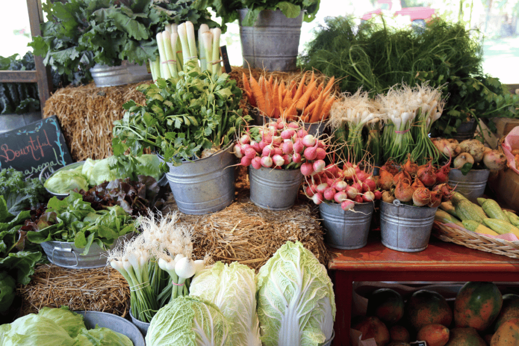 table of fresh food at a farmers market near gilbert arizona