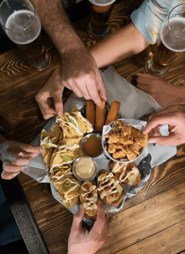 friends sharing an appetizer